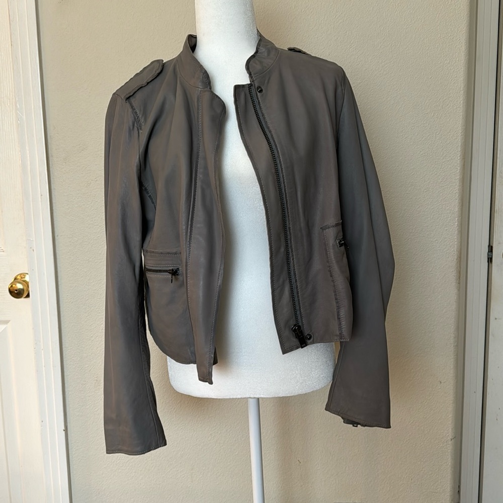 100% Lamb Leather zip up jacket.